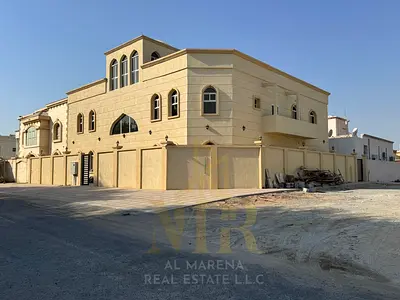 New (corner) villa for sale in Al Muwaihat 3, Ajman | Two floors and a roof terrace, prime location on two streets | 12 master bedrooms | Built-up are