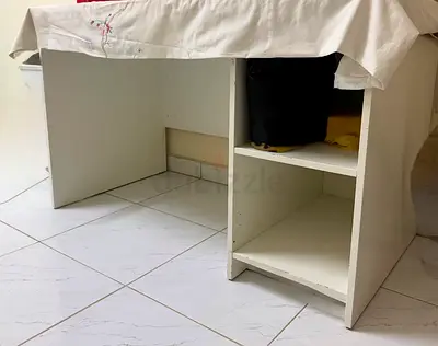 White wooden desk with open shelving - sturdy basic study table