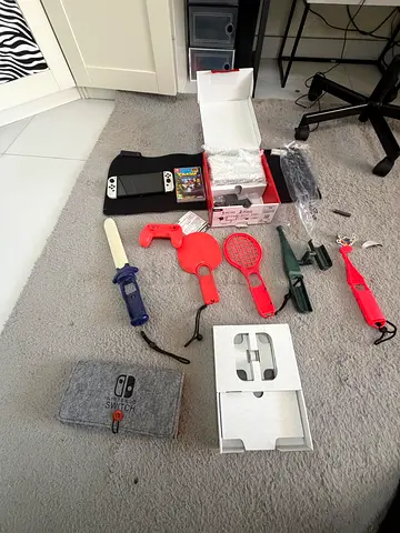 Nintendo Switch Joy-Con + accessories bundle (left & right grips, straps, case) negotiable