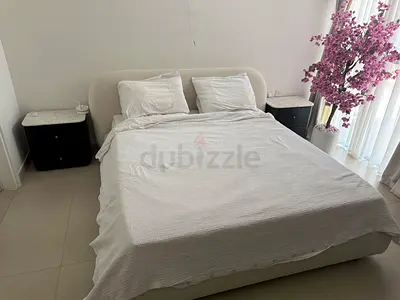 King bed with headboard , mattress and matching bedside tables