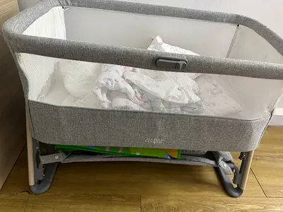 Portable baby bassinet / travel crib - light grey, gently used