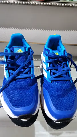 Blue Adidas kids' sneakers, size not specified, lightly used