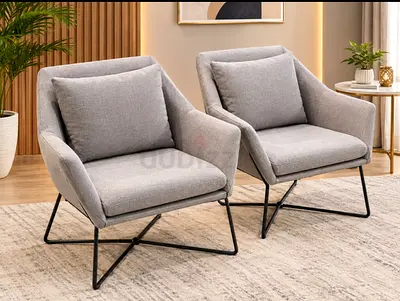 Pair of modern grey lounge chairs with metal legs
