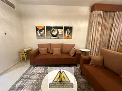 Resale of a 1-bedroom apartment (1BR + living room) in Orient Towers, Ajman | Area: 1,207 sq. ft. |
