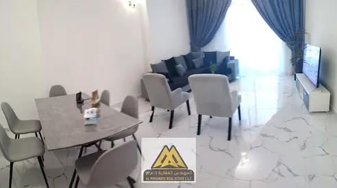 غرفتين وصاله/مساحة كبيره/2 بلكونه/بابراج الواحة الراشدية1 بجوار جميع والطرق الرئيسيه سهل الخروج الي دبي والشارقه