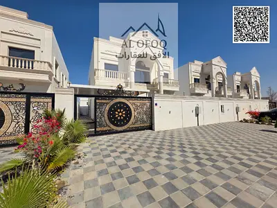 Villa for sale in Alamrah with easy payment, one of the most beautiful areas in the Emirate of Ajman, freehold for all nationalities,