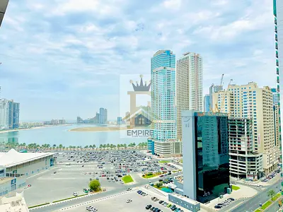 Spacious apartment with Sea view one month Freee easy exited Dubaii MAINTENANCE Freee with 6 Cheques payment opposite of expo Sharjah in al taawun