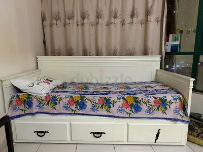 bed with storage compartment