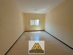 Spacious studio with a semi-separate kitchen, central air conditioning, and built-in wardrobes; main