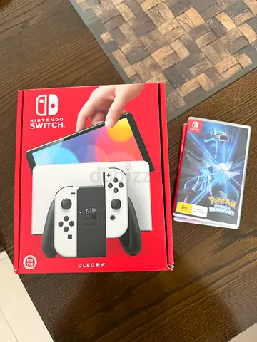 Nintendo switch oled 576gb + 2 games