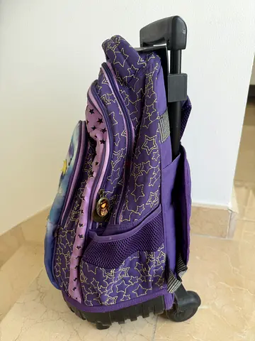 Santoro brand Purple kids rolling backpack with retractable handle - good condition