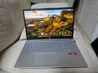 Slim silver laptop — light use, good condition