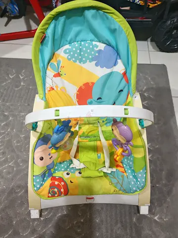 Baby rocker/bouncer seat with toy bar - good used condition