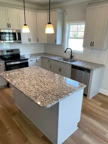 Modern kitchen island with granite top