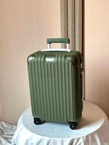 Rimowa green leather bag