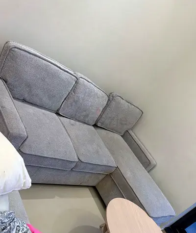 Light grey L-shaped corner sofa — good condition