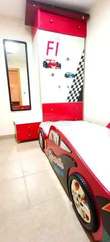 Red Race Car Kids Bed with Matching Wardrobe and Drawers