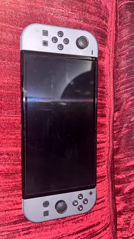Nintendo Switch Oled console with grey Joy-Cons - good clean and in working condition