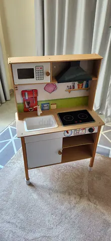 Wooden play kitchen for kids