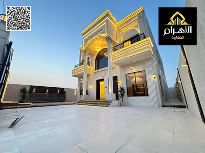 For Sale: A luxurious classic-style villa in Al Helio 2, Ajman (two floors + roof). The price includes registration and title transfer fees. Strategic