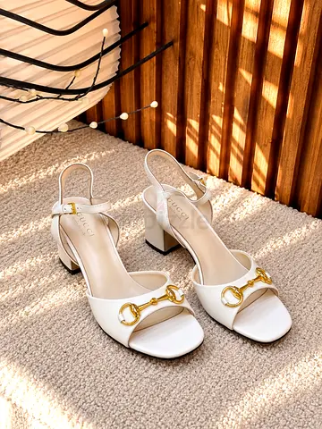 White leather slingback block heel sandals with gold hardware