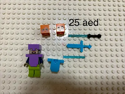 Mixed Minecraft-style building toy minifigures and accessories -