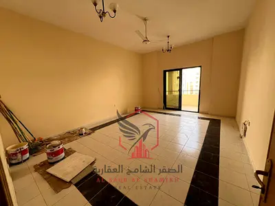 Annual rental in Al Qasimia Al Nad: 3 bedrooms & living room, spacious layout, balcony with open view, master maid’s room, 4 bathrooms, central AC