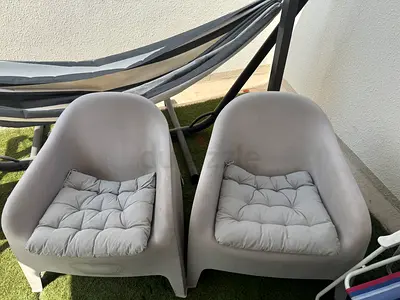Pair of IKEA SKARPÖ outdoor armchairs with cushions  - comfortable and relaxing