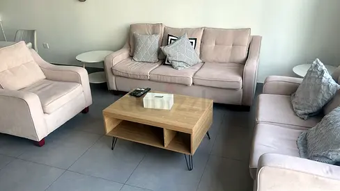 Living room , 1 sofa 2 seaters , 1 3-seater & I chair 1 seater and coffee table - normal condition