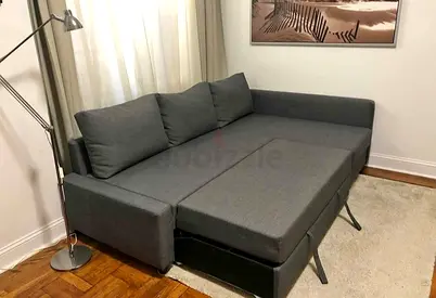 IKEA Friheten Sectional Sofa Bed W Storage 
In Dark Grey For Sale.
