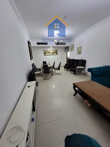 2BR for sale in Queen Tower, Al Qasba, 1,250 sqft, no parking, service fees approx. AED 4,000. Asking AED 580K.