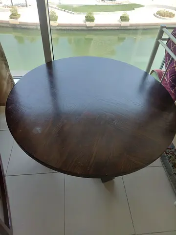 Round dark wood center table