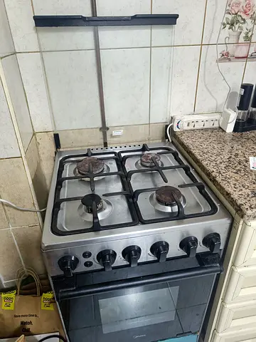 Used 4-Burner Gas Cooker with Oven - Good Working Condition