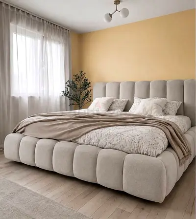 Modern upholstered king-size platform bed with padded headboard