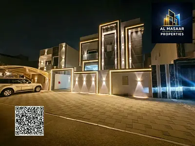 Villa for sale in Ajman | Al Helio 2 area | 6 bedrooms, majlis, 2 living rooms, maid's room, and rooftop | Freehold | Price includes water and electri