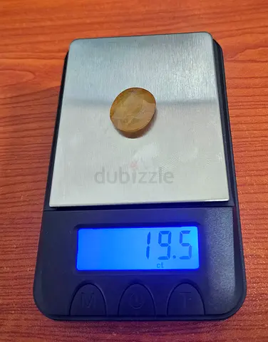 Loose faceted yellow-brown gemstone, 19.5 ct oval