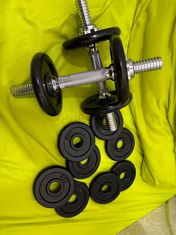 Adjustable Dumbbell Set with Multiple Weight Plates - Excellent Condition