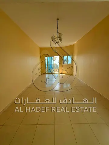 English: Exclusive Al Majaz 3 Offer | 3BR with Separate Living Room, Large Hall, 3 Bathrooms & Balcony, Family Residence, Free Parking, AED 65,000.