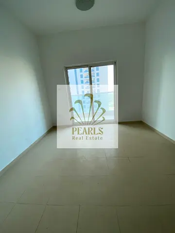 2BR + Living Room in City Tower, Al Nuaimiya 3, opposite Grand Mall and next to Al Safeer Mall. Master bedroom, 2 baths, balcony & free parking.