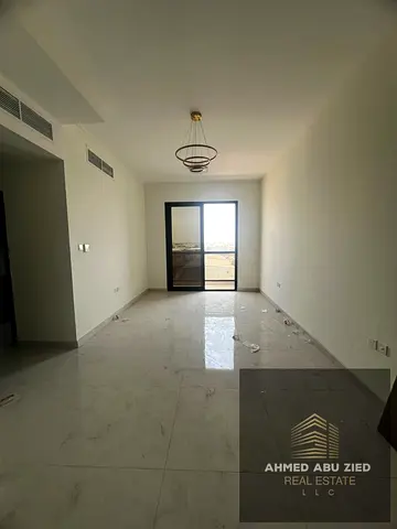 Two master bedrooms, a spacious living area, and a large kitchen. Features include central air conditioning, three bathrooms, high-end finishes, two b