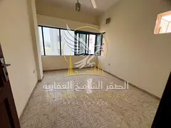 Two bedroom apartment with a living room for rent in Al Butina Sharjah spacious layout split AC and