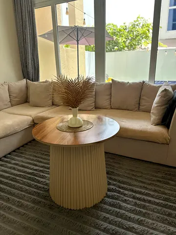 Round ribbed pedestal side table - neutral beige