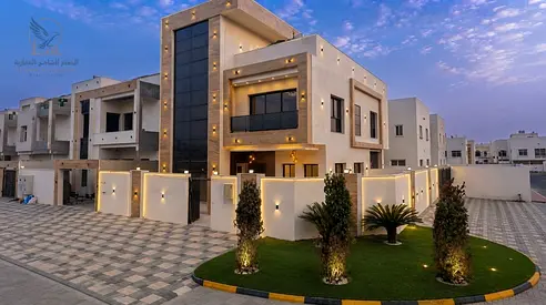 Modern corner villa for sale in Al Zahya Ajman six master bedrooms pool roof premium finishes fully equipped kitchen freehold for all nationalities