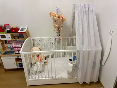 Pinolino white wooden baby crib with canopy and mattress