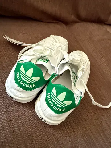 White Balenciaga-style Adidas sneakers with green heel logo, brand new