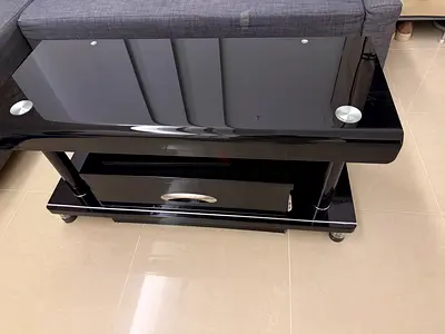Black glossy TV stand / media console with glass top and drawer