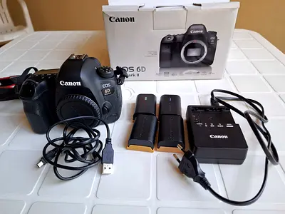Canon 6D Mark II – Body in good condition + charger and 4 new batteries