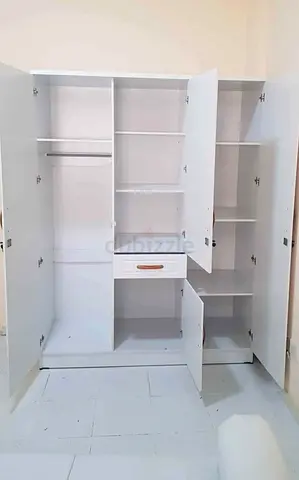 White 4-Door Wardrobe with Shelves and Drawer