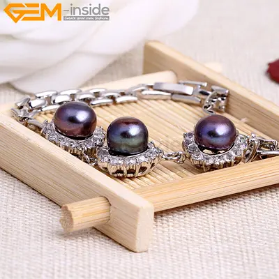 Silver-tone Bracelet with Dark Natural Pearl and Crystal Accents. New. Never Worn. AED 990 Only.