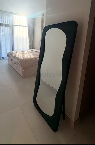 Full-length freestanding wavy frame upholstered mirror — dark green, new condition